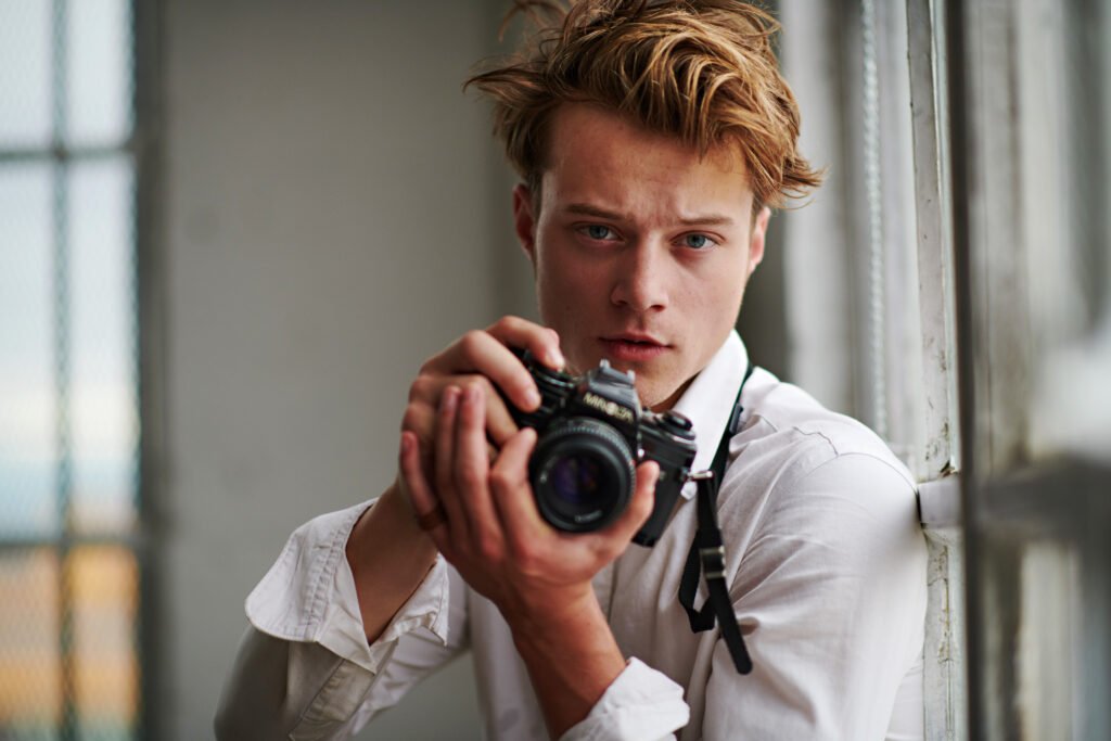 Rudy Pankow with a camera