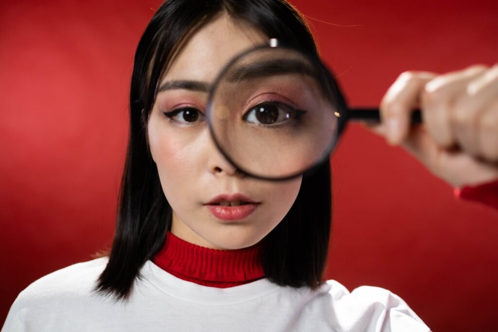 Girl with magnifying glass