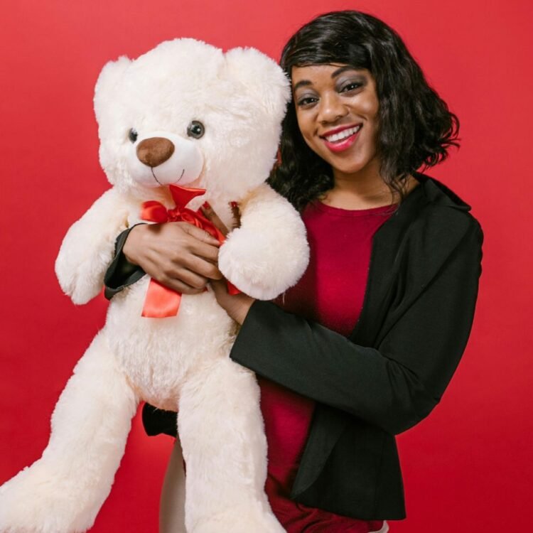 Woman Holding a Teddy Bear