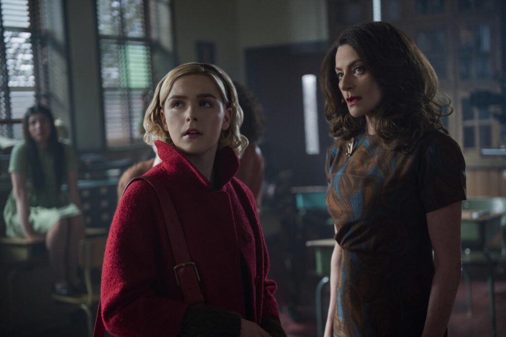 Michelle Gomez and Kiernan Shipka in Chilling Adventures of Sabrina (2018)