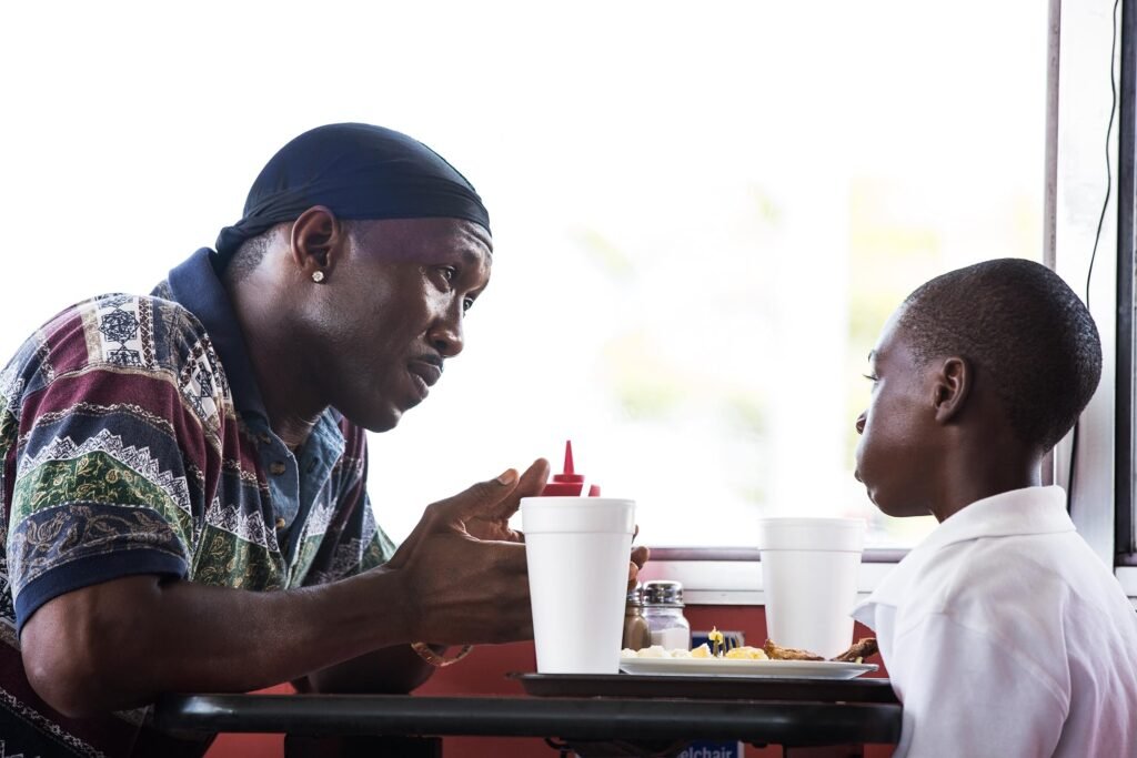 Mahershala Ali and Alex R. Hibbert in Moonlight (2016)