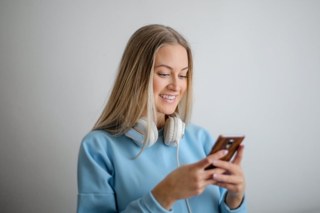 Girl holding mobile phone