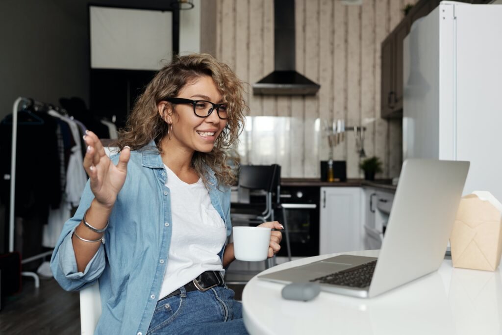Woman chatting on a laptop
