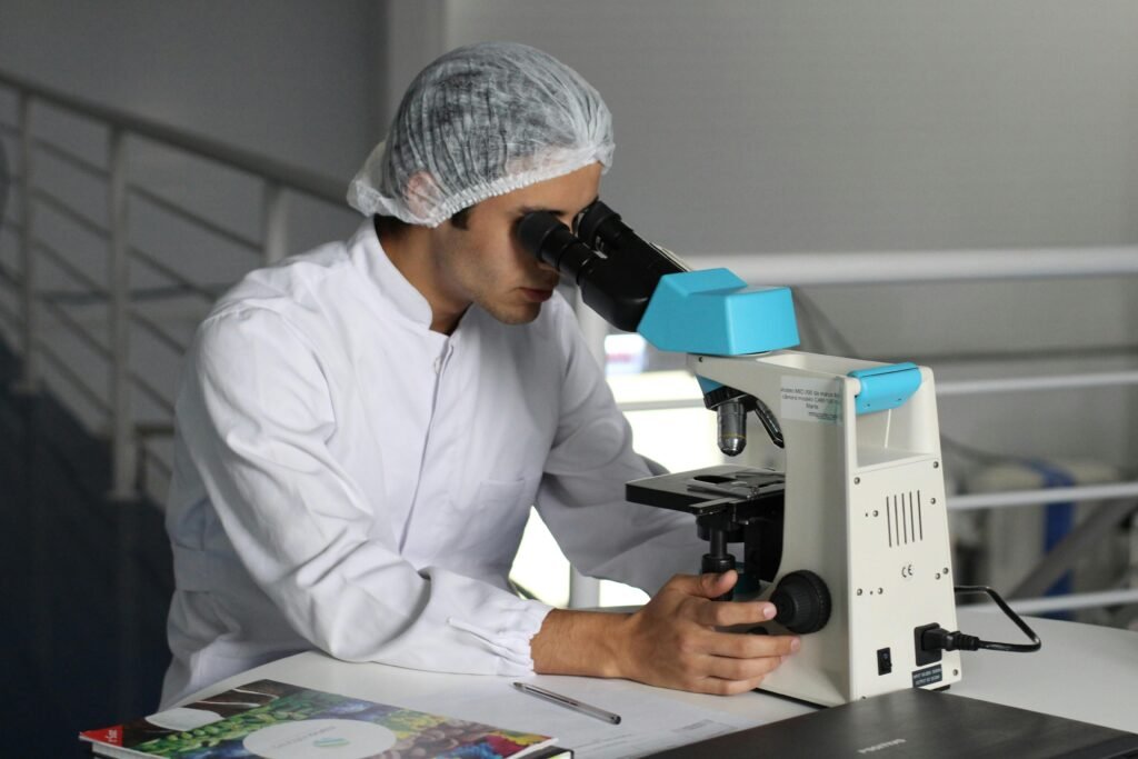 Scientist Using Microscope