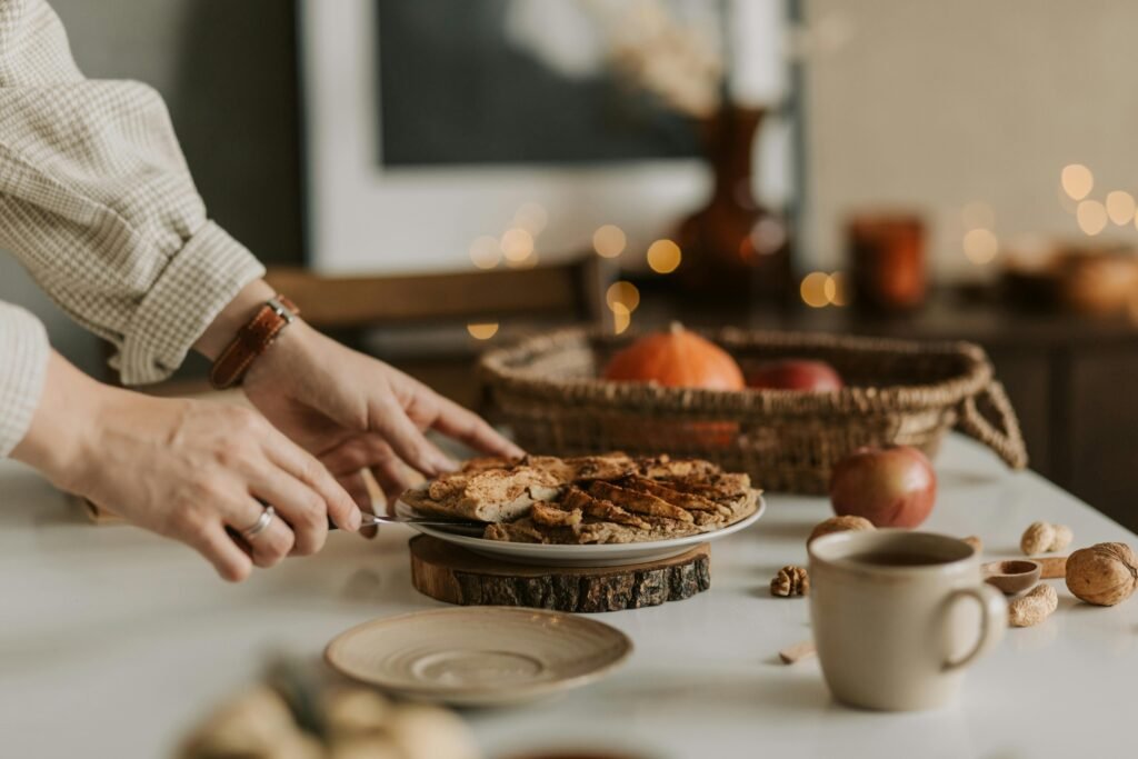 A Person Getting a Slice of Apple Pie
