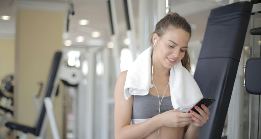 Girl listening to music on mobile phone