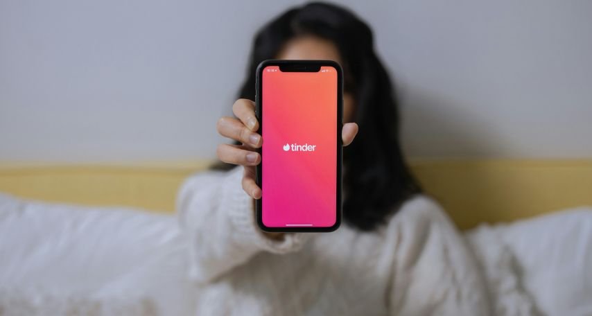 A Woman Showing Her Smartphone