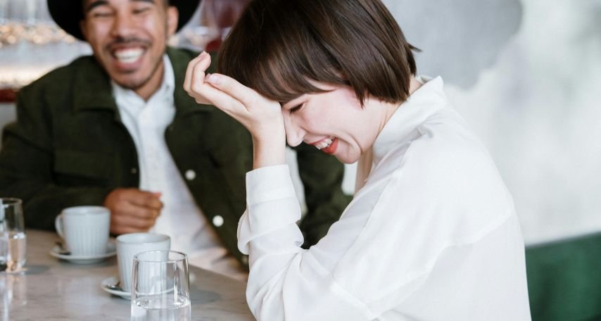 A man and woman laughing