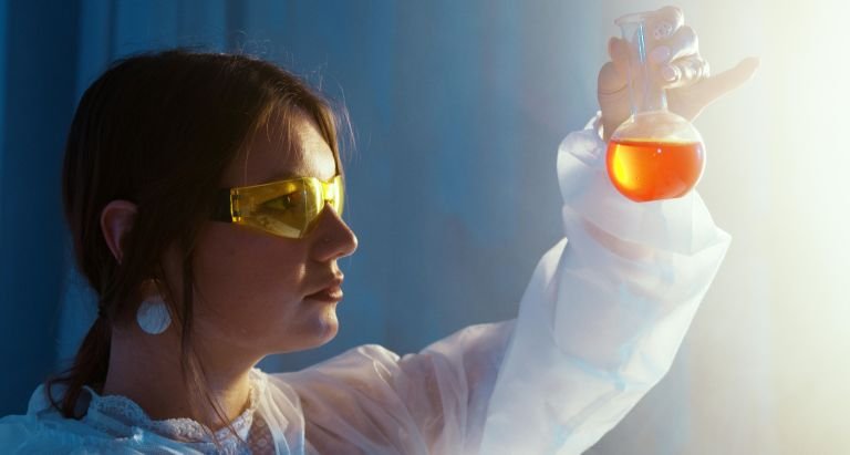 A Woman Doing an Experiment
