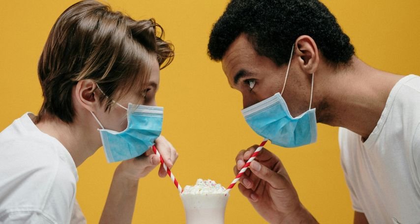 Man and Woman Drinking Milkshake