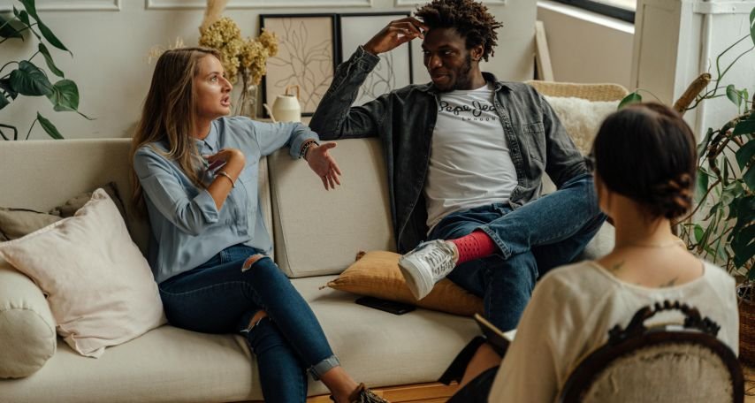 A Woman and a Couple Talking