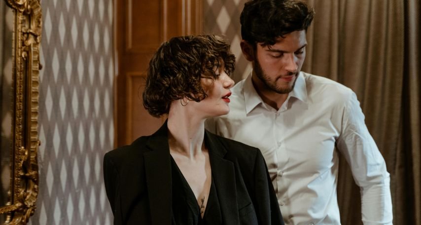 A Man with His Arm around a Woman
