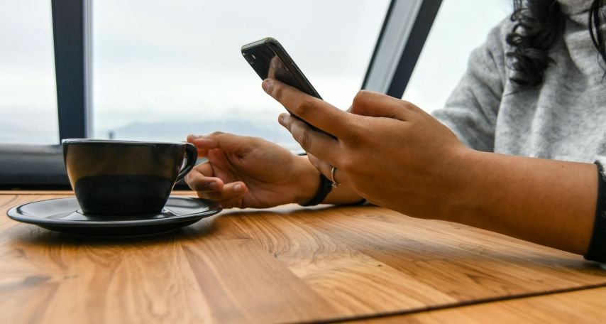 Person Holding mobile phone