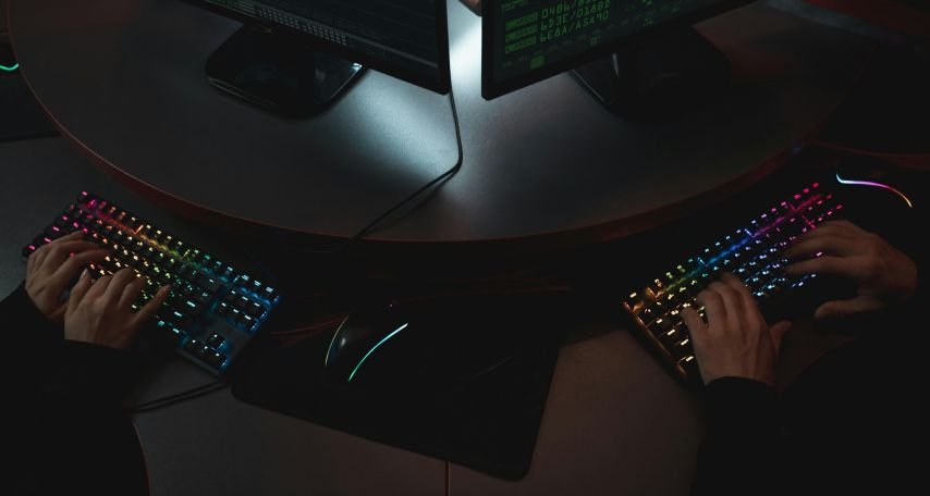 People Typing on Keyboards