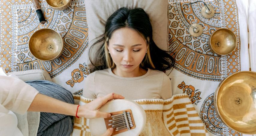 Woman Relaxing while Listening to Sounds