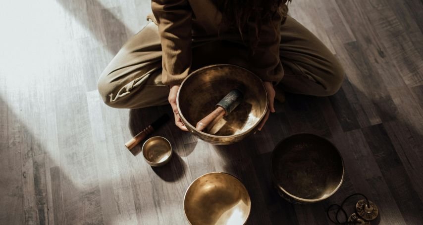 A Person Holding a Tibetan Singing Bowl