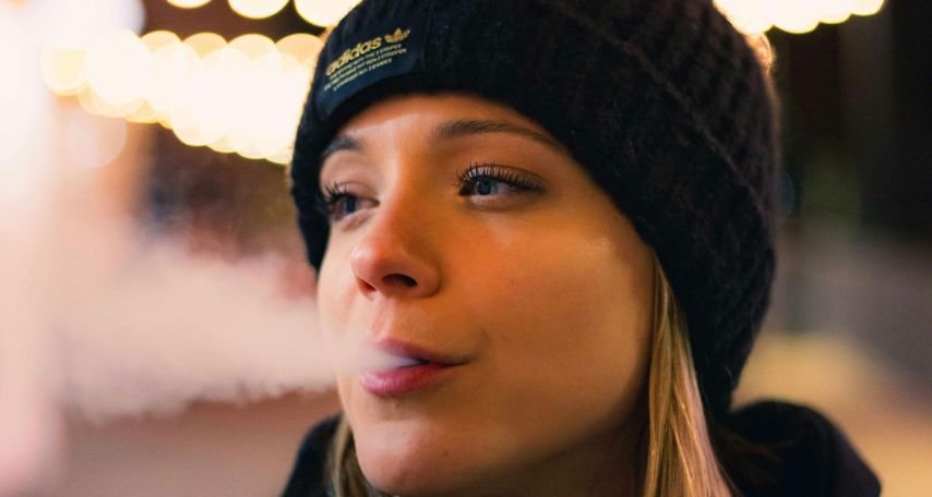 Blonde Woman Vaping
