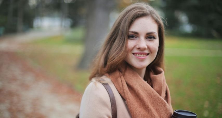 Woman Holding Disposable Cup