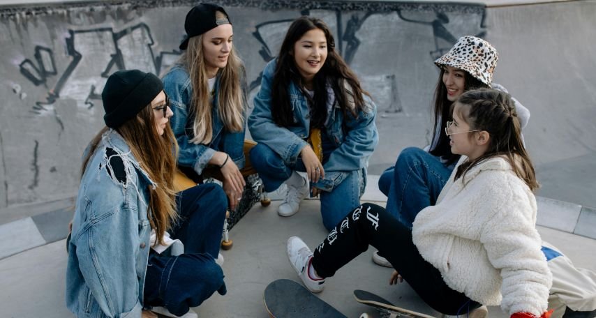 Friends Hanging Out at the Skatepark

