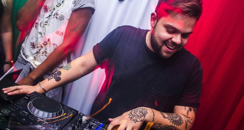 Man Playing Dj Controller
