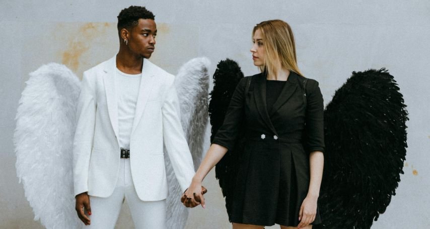 A Couple Holding Each Other's Hands
