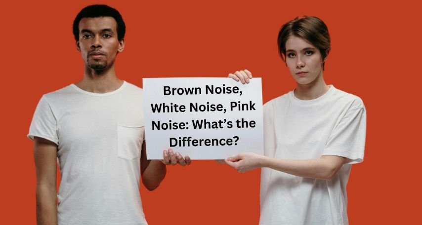 Two people holding up a sign