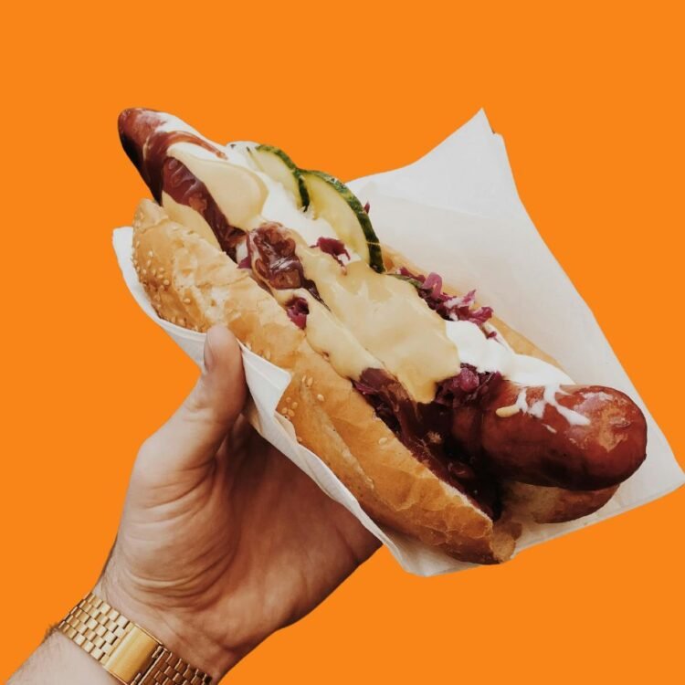 Person Holding Hotdog