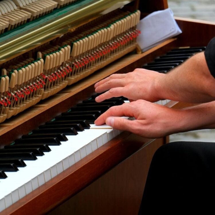 Person Playing Piano Photo