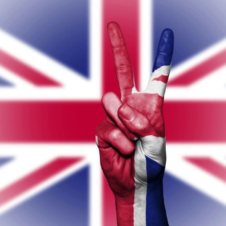 Peace Sign in Front of A UK Flag
