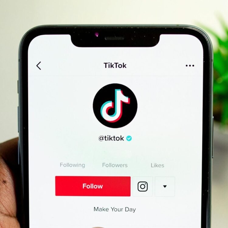 Smart Phone Displaying Tiktok Profile
