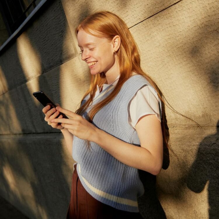 A Young Woman Using a Cellphone