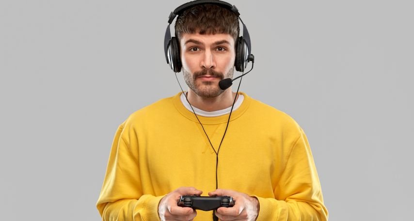 A young man with a game controller