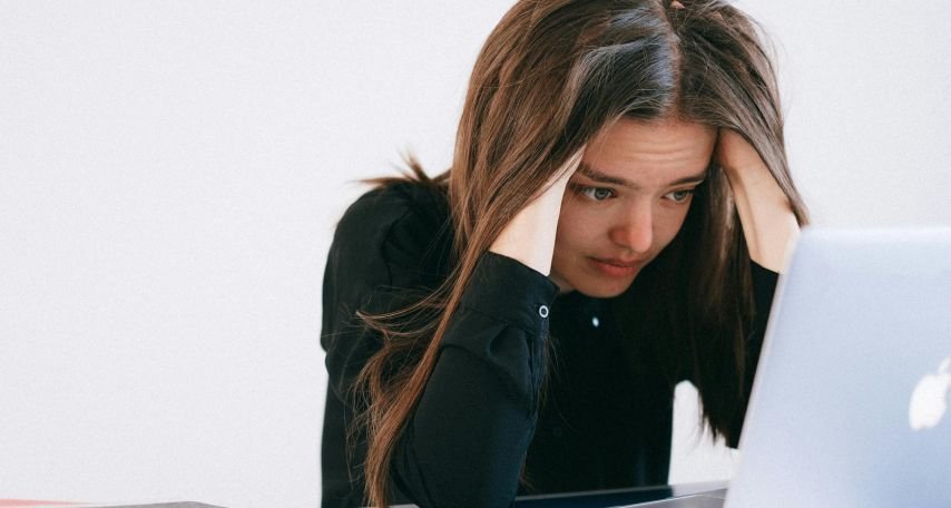 Woman Looking at a Laptop
