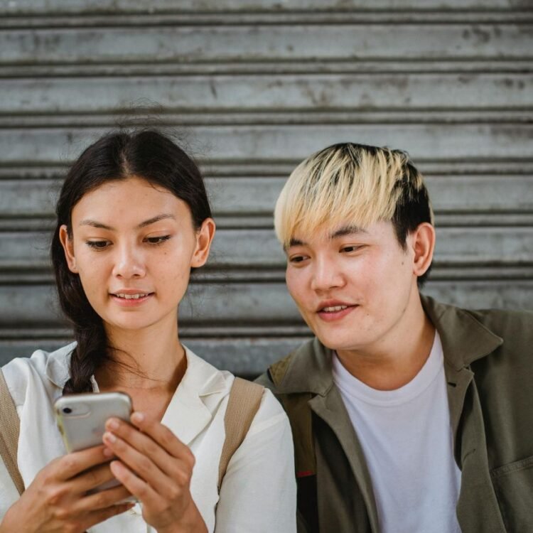 Teenagers using smartphone