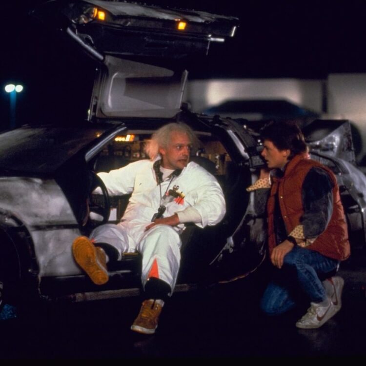 Michael J. Fox and Christopher Lloyd in Back to the Future with the DeLorean
