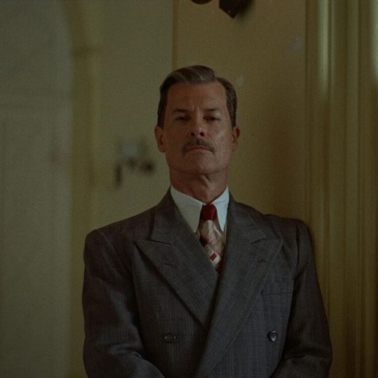 Guy Pearce plays Harrison Lee Van Buren. A24