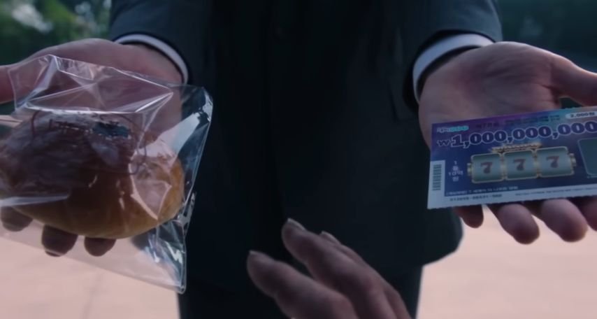 Salesman offering the choice of food or a lottery ticket Squid Game Netflix