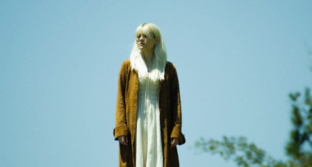 girl on a hill x Sarah Barrios Evoke Haunting Yearning on Amelia