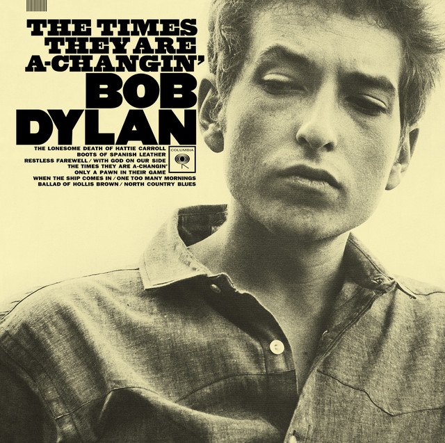 Album cover of Bob Dylan’s The Times They Are A-Changin’, featuring a close-up black-and-white portrait of Dylan.