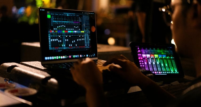 Lo-fi music producer working on a laptop