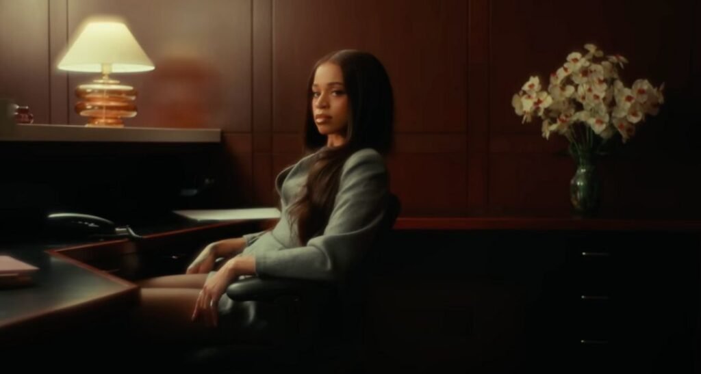 Ella Mai – “Tell Her” Official Music Video: Watch the Office-Set Ultimatum